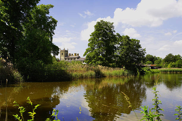 church a church reflected in a lake coughton stock pictures, royalty-free photos & images