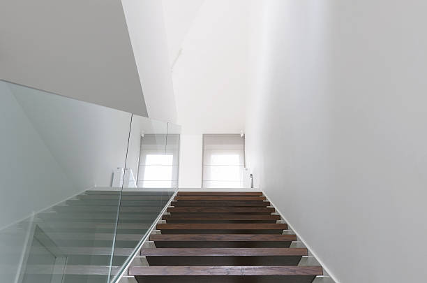 istock wooden staircase and glass balustrade 466000962