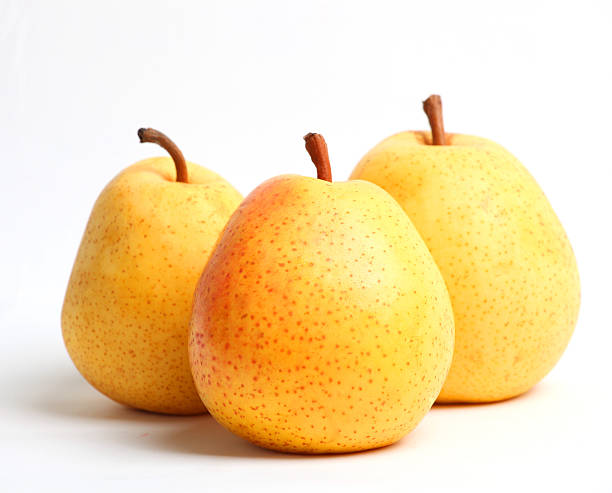 istock Three yellow juicy pears Closeup 466003658
