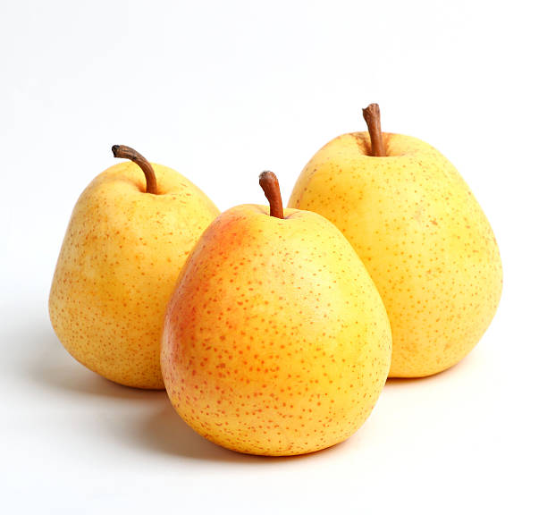 istock Three yellow juicy pears Closeup 466003660