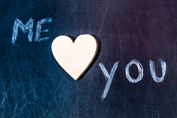 istock me and you wooden heart 466005209