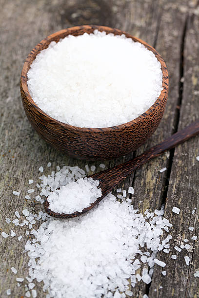 istock sea salt on wooden background 466006279