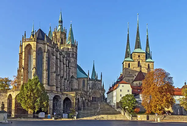 Erfurt Cathedral and Severikirche,Germany. Both churches tower above the town scape and are accessible via huge open stairs called Domstufen.