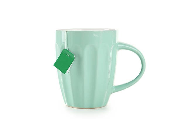 istock Cup of tea with tea bag isolated on white 466007776