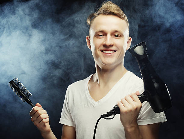 istock young t hairstylist looking at camera 466008178