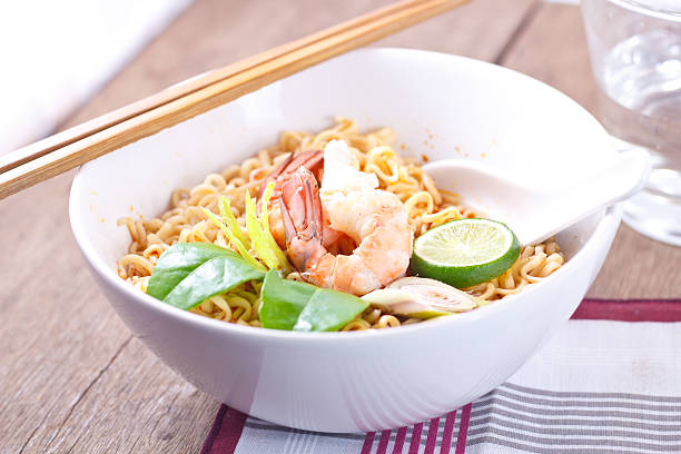 istock Hot and spicy instant noodle on the wood table. 466009014