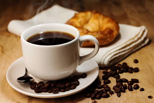istock coffee,croissant and bean on wooden 466010255