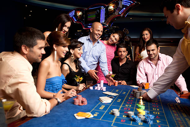 73,600+ People Gambling Stock Photos, Pictures & Royalty-Free Images -  iStock | Young people gambling