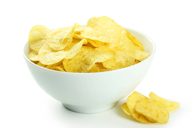 istock Potato chips in bowl isolated on white 466011662