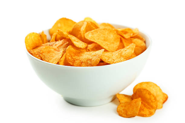 istock Potato chips in bowl isolated on white 466012030