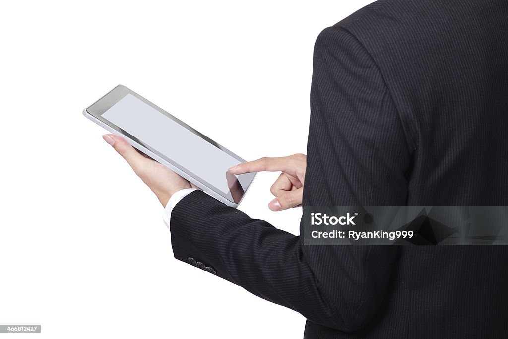 Uomo d'affari utilizzando il touch pad - Foto stock royalty-free di Adulto