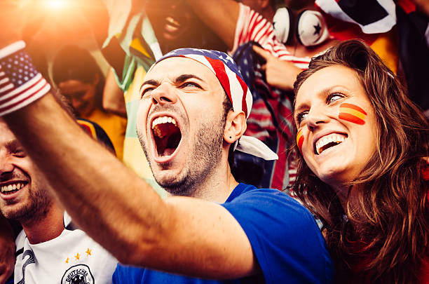 istock Fans of different nations at the stadium together 466013139