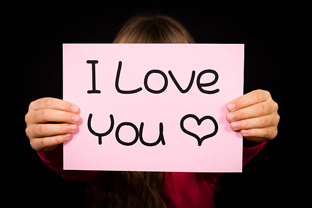 istock Child holding I Love You sign 466017166