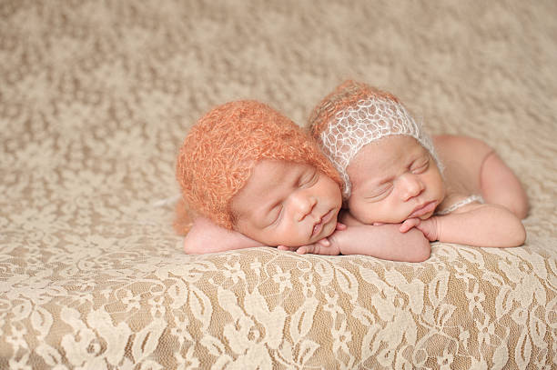 istock Sleeping Newborn Twin Girls 466017623