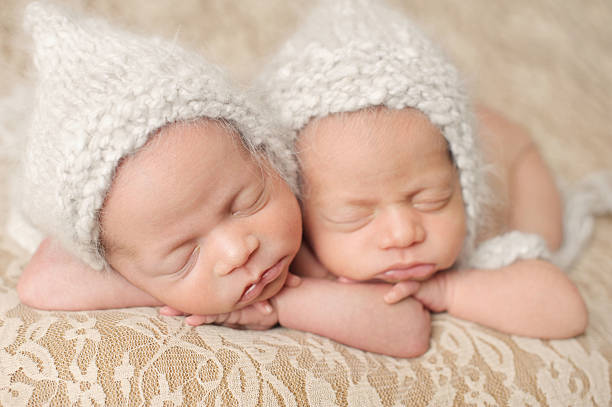 istock Sleeping Newborn Twin Girls 466017629