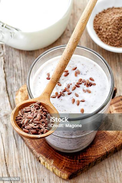 Glass Of Greek Yogurt With Crushed Flax Seeds Stock Photo - Download Image Now - Flax Seed, Yogurt, 2015