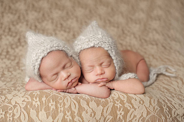 istock Sleeping Newborn Twin Girls 466017815