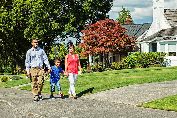 istock Happy Family of Three Going for a Walk 466018859
