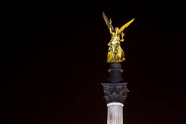 Low angle view of Marienplatz, The New Town Hall (Neues Rathaus) at night in Munich, Germany.