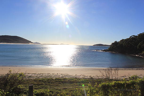 istock Nelson Bay sun shinning over the beach 466020046