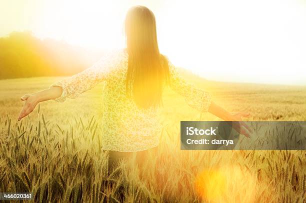 Young Woman Standing On The Field Stock Photo - Download Image Now - Adult, Adults Only, Agricultural Field