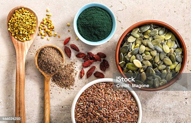 Various Superfoods On Kitchen Table Stock Photo - Download Image Now - 2015, Antioxidant, Body Care