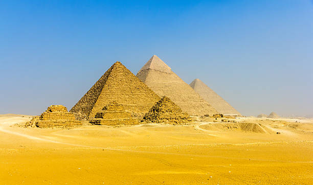 istock View of pyramids from the Giza Plateau: three Queens' Pyramids 466024386