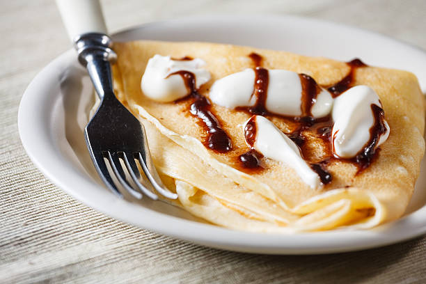 istock French style crepe with cream and chocolate sauce 466025703