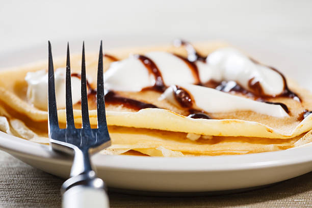 istock French style crepe with cream and chocolate sauce 466025753