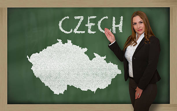 istock Teacher showing map of czech on blackboard 466028504