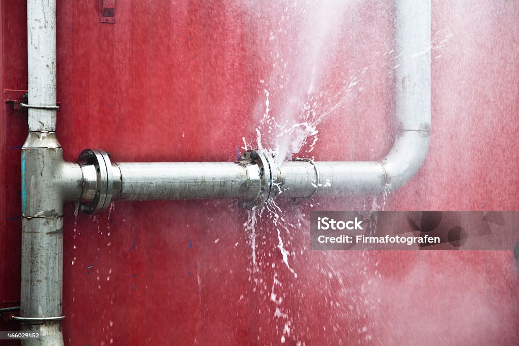 Leaking Pipe High pressure pipe leaking Water Pipe Stock Photo