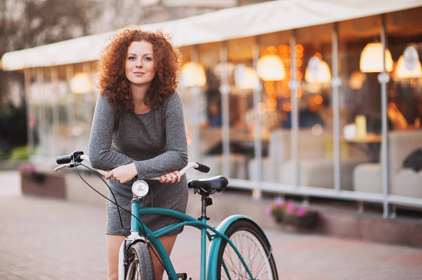 istock Gorgeous woman with bike 466032918