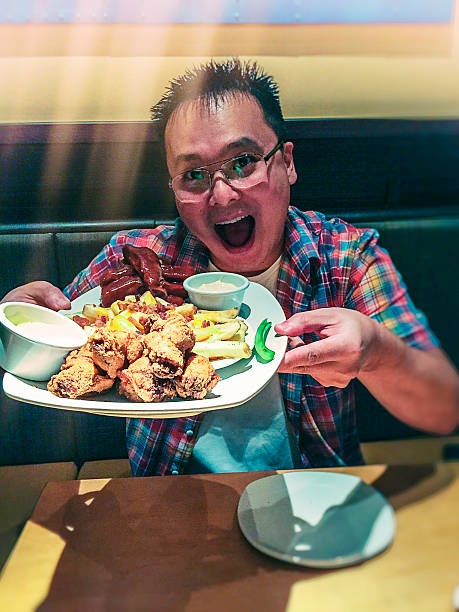 istock Japanese man holding his food dish. 466033430