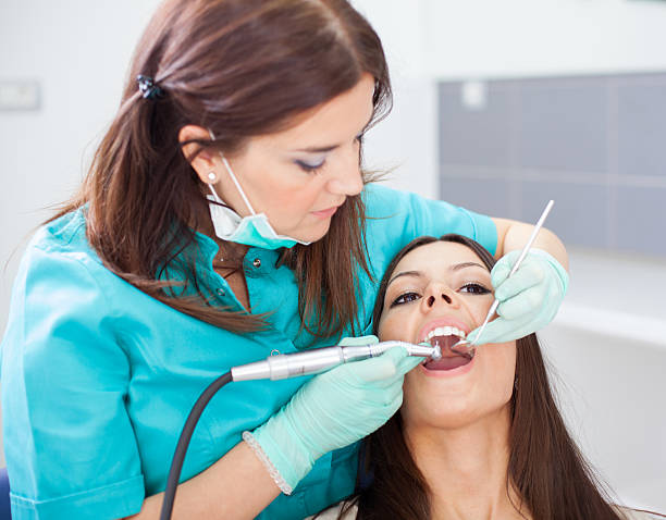 istock Young woman patient and dentist 466033791