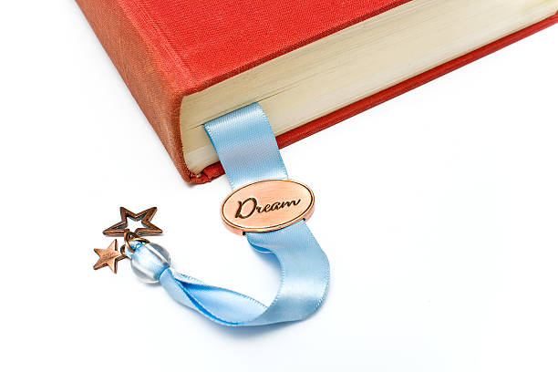 istock Bookmark in a book isolated on white 466034086