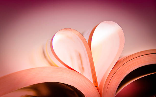 istock pages of a book curved into a heart shap 466034445