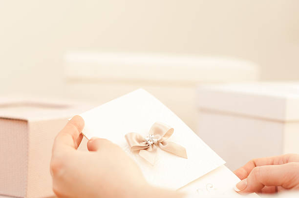 istock Woman holding a wedding invitation 466036966