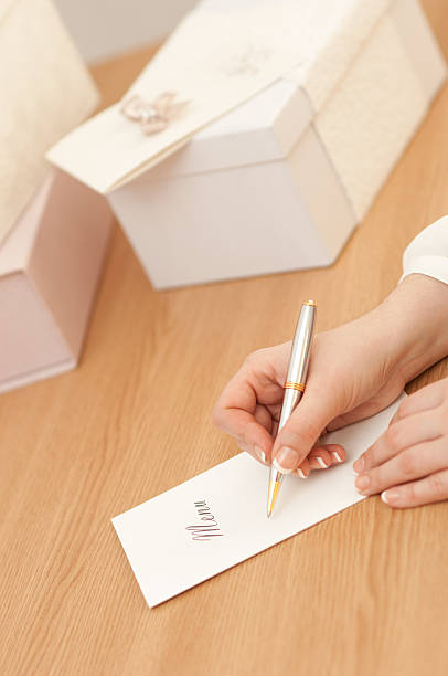 istock Woman writing on a wedding menu 466037050