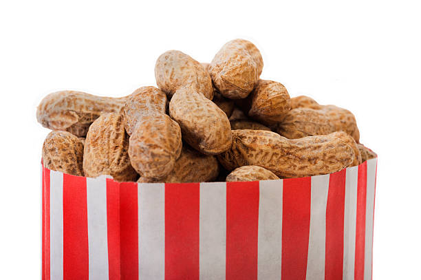 Roasted Peanuts in a red and white Paper Bag