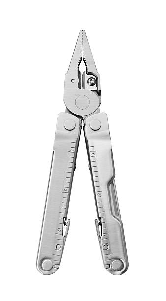 Steel multitool Steel multitool isolated on white background rustproof stock pictures, royalty-free photos & images
