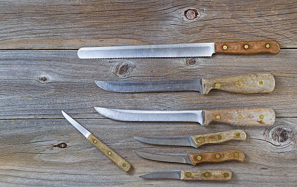 istock Vintage knives on rustic wood 466045716