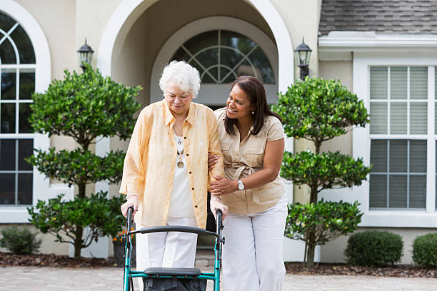istock Senior woman with caregiver 466048881