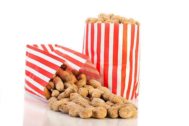 Roasted Peanuts in a red and white Paper Bag