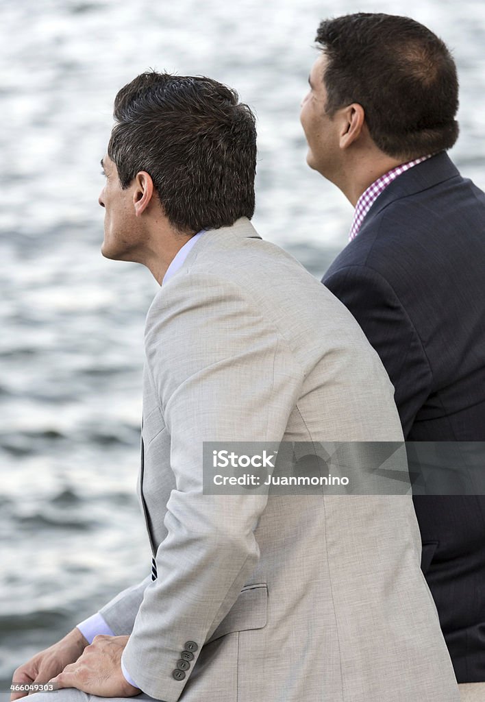 Gay couple looking at the sea Mature Gay couple looking at the sea 40-44 Years Stock Photo