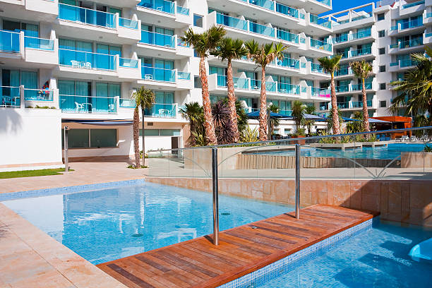 istock sunny lounge near the pool 466050591