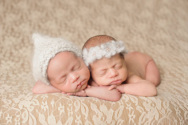 istock Sleeping Newborn Twin Girls 466051387