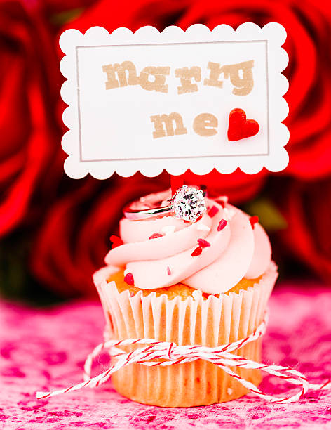 istock Wedding Cupcake with Engagement Ring and Marry Me Sign 466052515