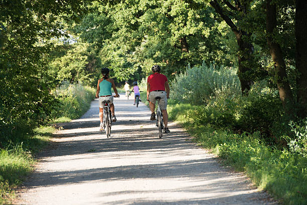 istock Family cycling in Park 466059637