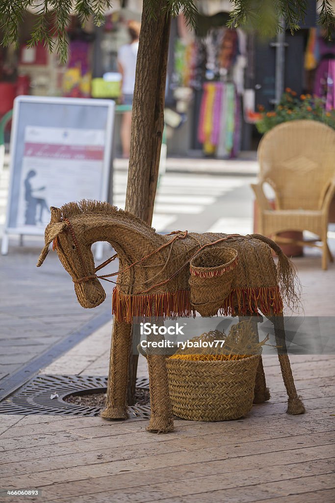 Straw donkey. Straw Spanish donkey as a souvenir. Agriculture Stock Photo