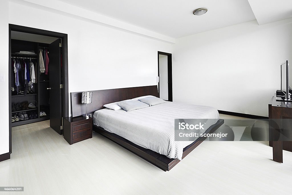 Interior design series: Modern Bedroom with big empty white wall Apartment Stock Photo
